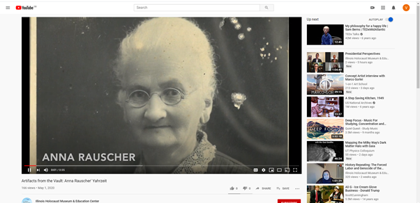 A YouTube still. The video shows a sepia photograph of a elderly woman. Text reads: Anna Rauscher.